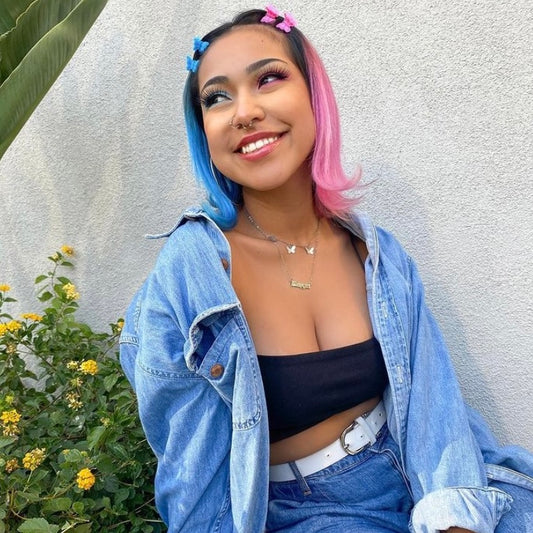 Model with split dyed blue and pink hair